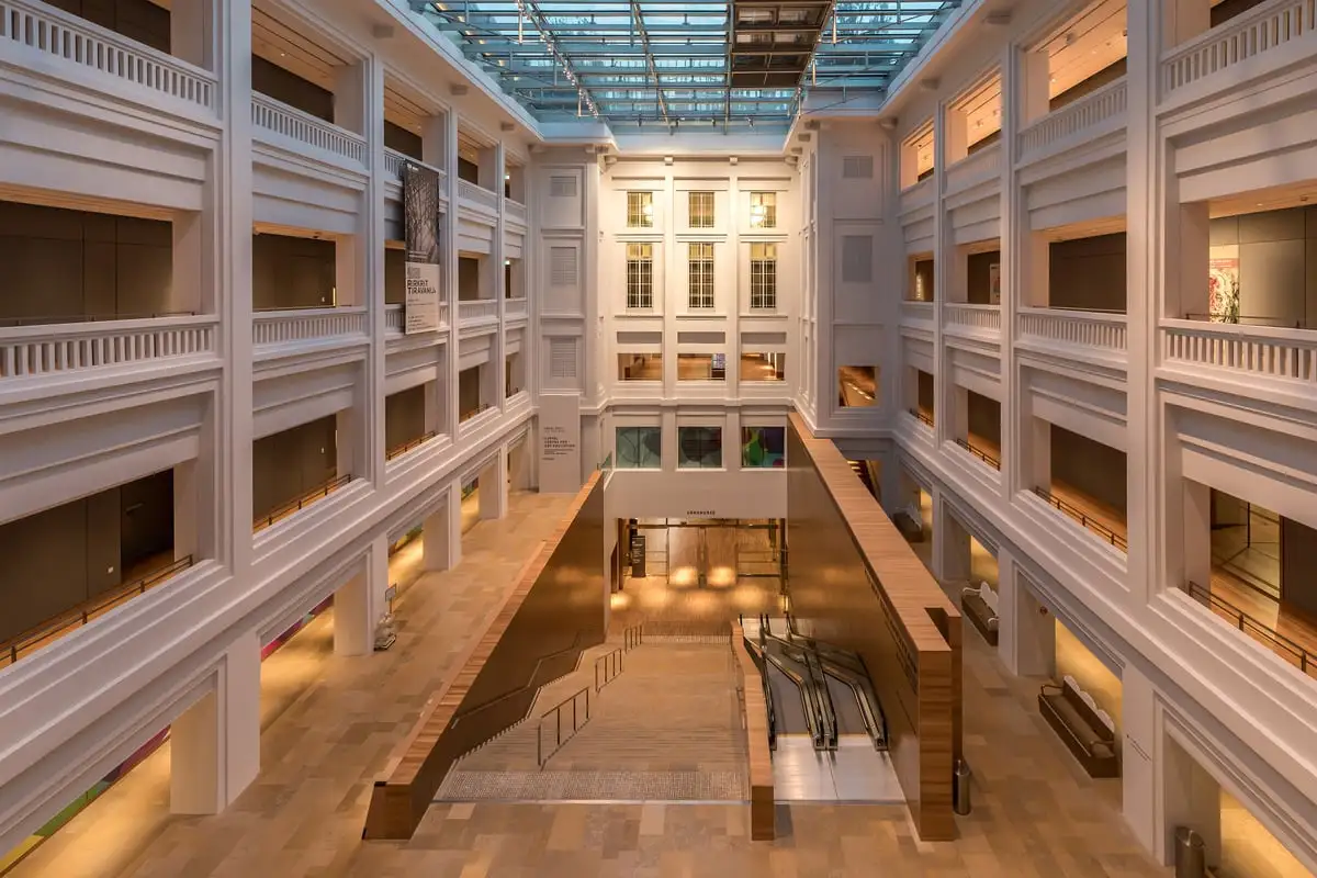 The linking atrium and staircase inside National Gallery Singapore